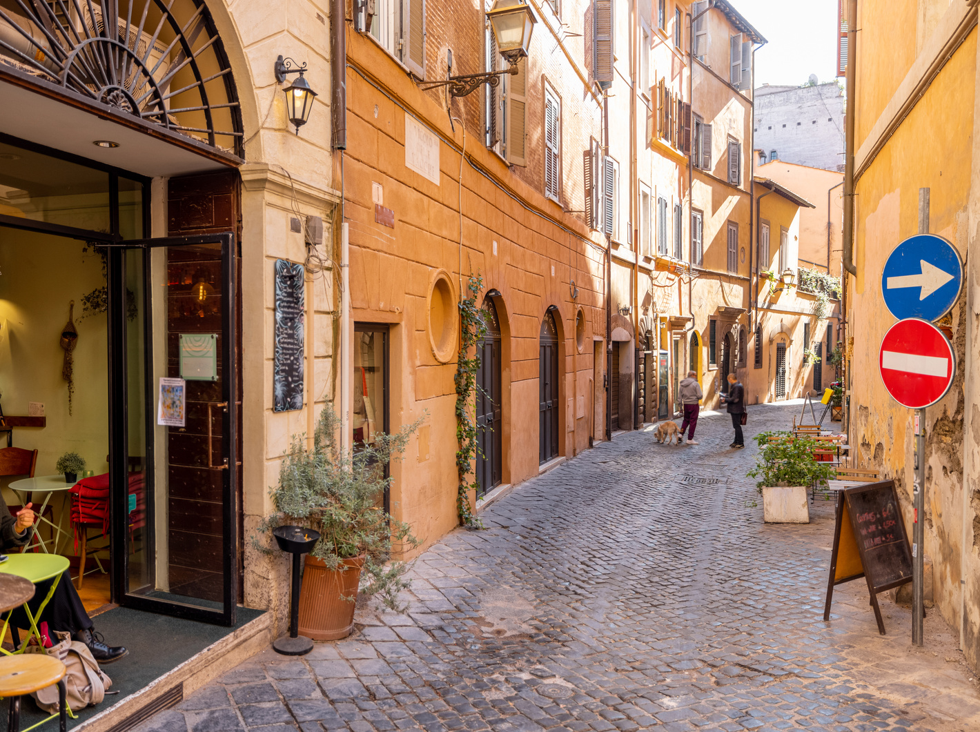 Narrow Street with Cafe and Small Shops in Rome